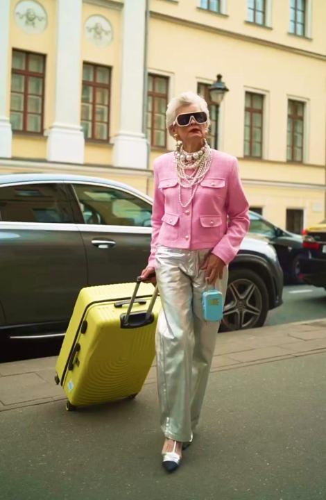 Aviasales granny with a mini suitcase